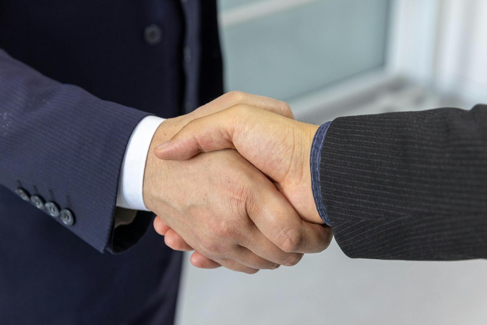 D&D Legacy Capital partnership handshake